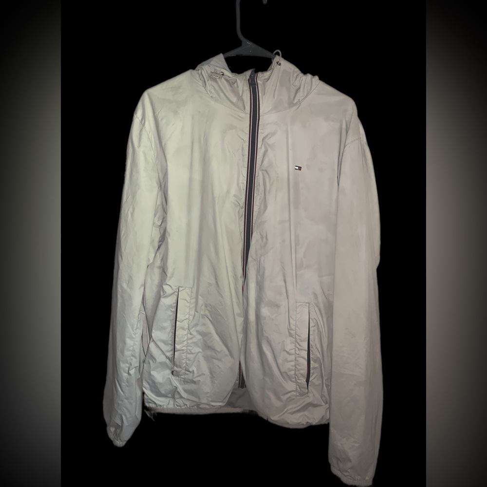 Large white Tommy Hilfiger windbreaker.